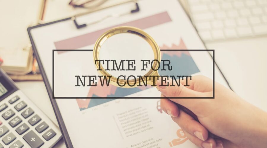 Picture of clipboard with paperwork overlaid with text, "Time for New Content"